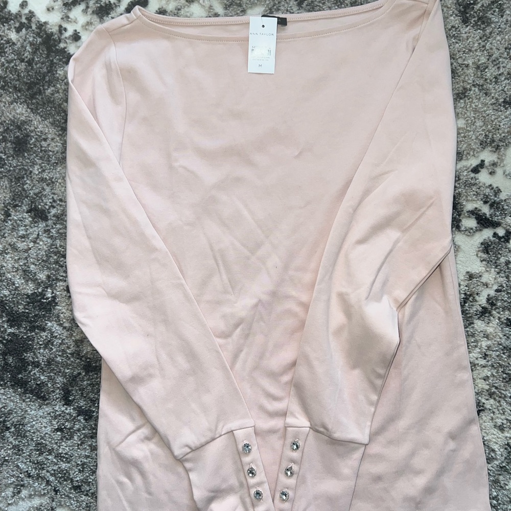 Ann Taylor crew neck long sleeve pale pink top with jeweled cuffed buttons